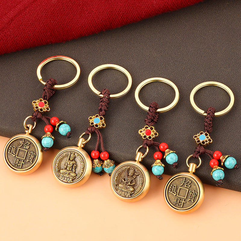 Brass Rotating Guardian Deity Keychain with Green Bead Cord