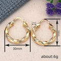 Faceted Twist Hoop Earrings in Gold-Tone Metal Jewelry view 4
