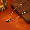Brown And Gold Tone Beaded Necklace With Dark Round Pendant view 4