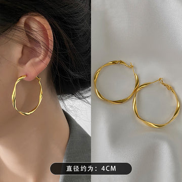 Twisted Metal Hoop Earrings In Three Sizes And Colors