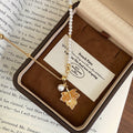Pearl Strand Necklace With Gold Tone Maple Leaf Pendant view 2
