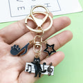 Piano and Music Note Charm Keychains Featuring Cat Across 33 Pictured Variations view 1
