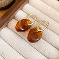 Amber Brown Resin Drop Hoop Earrings in Two Rounded Shapes view 6