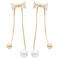 Crystal Bow and Pearl Drop Earrings with Polished Metal Details view 5