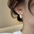 Gold Tone Pink Heart Huggie Earrings with Glossy Enamel Inlays view 3