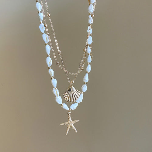 Gold-Tone Shell and Starfish Layered Necklace shown from a second product angle