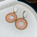 Woven Circle Drop Earrings with Sculpted Polished Metal Details view 12