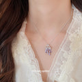 Pastel Flower and Butterfly Pendant Necklaces in Three Colors view 3