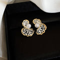 Gold And Silver Floral Stud Earrings In Three Sculpted Designs view 8