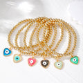 Gold Bead Stretch Bracelet Heart Evil Eye Charm 6 Colors view 1