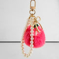 Faux Fur Pompom Charm With Pearl Beaded Strap And Bow view 2