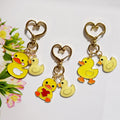 Yellow Duck Pair Heart-Clasp Charms in Three Designs view 5
