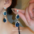 Silver Tone Blue Teardrop Necklace And Long Earrings With Halos view 4