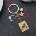 Four Cat Art Card and Floral Metal Keychain Design Set view 5