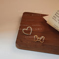Gold Tone Asymmetric Hollow Bow And Pave Heart Stud Earrings view 6