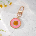 Round Resin Daisy Keychains Gold Silver Frames 6 Styles view 3