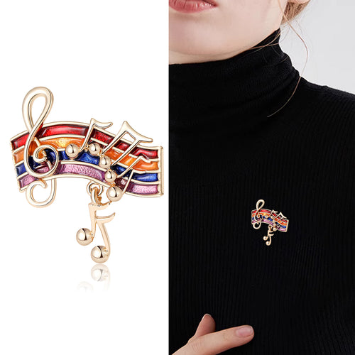Rainbow Music Notes brooch angled display showing the raised details