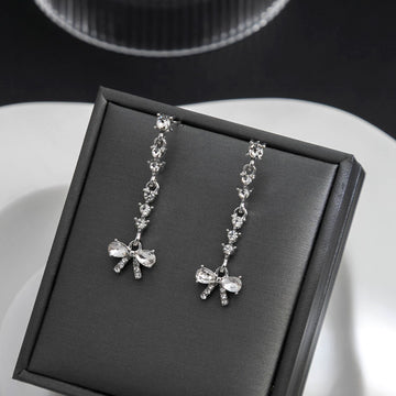 Clear Bow Silver Tone Long Line Dangle Stud Earrings