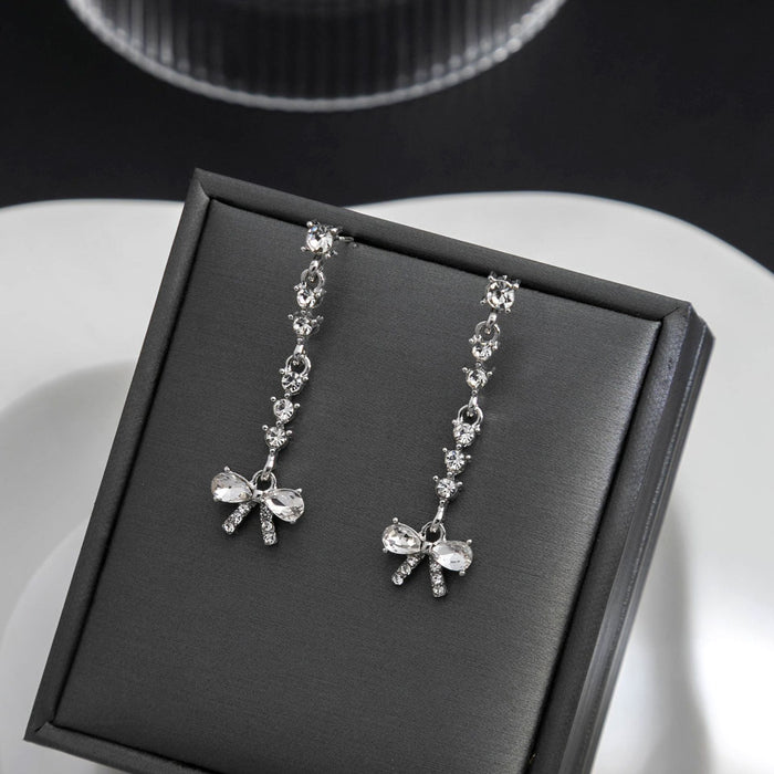 Clear Bow Silver Tone Long Line Dangle Stud Earrings