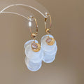 White Shell Disc Cluster Hoop Earrings in Silver and Gold Tones view 7