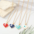 Gold Tone Enamel Winged Heart Evil Eye Pendant Necklaces view 1