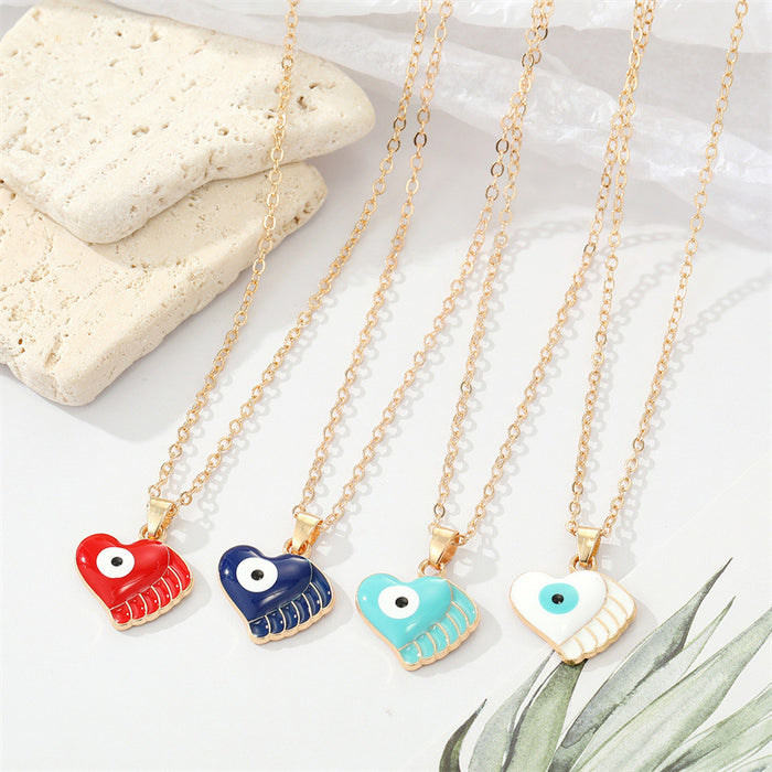 Gold Tone Enamel Winged Heart Evil Eye Pendant Necklaces