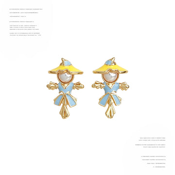 Gold Tone Blue Outfit And White Pearl Scarecrow Stud Earrings