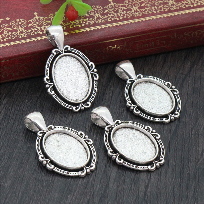 Scroll Edge Oval Pendant Cabochon Setting in Antique Silver