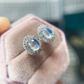 Silver Tone Oval Moonstone Look Halo Stud Earrings view 2