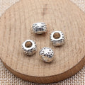 Patterned Large Hole Spacer Beads in Two Antique Finishes view 2