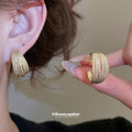 Gold Tone Layered Textured Multi Band Wide Hoop Earrings view 2