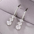 Graduated Three-Stone Long Drop Earrings In Polished Silver Tone view 3