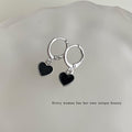 Silver Huggie Hoop Earrings With Black Heart Charm view 4