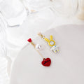 Two Mismatched Animal Heart Novelty Dangle Stud Earrings view 3