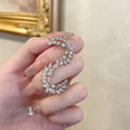 Silver Tone Leaf Wreath Stud Earrings with Clear Stones view 6