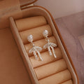 Silver Bow Pearl Look Open Ribbon Dangle Stud Earrings view 3