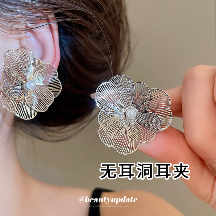 Silver Tone Floral and Clustered Pearl Ear Clip Designs