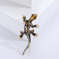 Branch Lizard Brooch in Metal with Textured Lizard Resting on a Slender Branch view 7