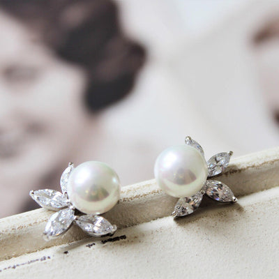 Pair silver pearl flower stud earrings with marquise CZ leaves