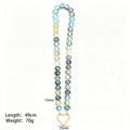 Mixed Twelve Millimeter Flat Bead Necklaces With Three Clasps view 6