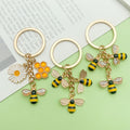 Bee and Honeycomb Charm Keychains Featuring Yellow Sunflower Across 47 Pictured Variations view 2