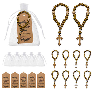 A packaged brown bead rosary bracelet beside multiple bracelets, white bags, and printed tags.