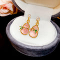 Gold Tone Pink Gourd Pearl Drop Earrings with Leaf Detail view 6