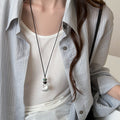 Black Cord Necklace with Silver Tone Sculptural Pendant view 2