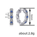 Silver Tone Hoop Earrings With Alternating Blue and Clear Stones view 4