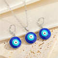 Round Blue Evil Eye Pendant Necklaces and Earrings in Two Finishes view 4
