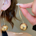 Textured Metallic Ball Long Wire Hook Earrings In Two Tones view 3