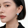 Silver Tone Translucent Aqua Star Earrings In Stud And Clip On Styles view 2
