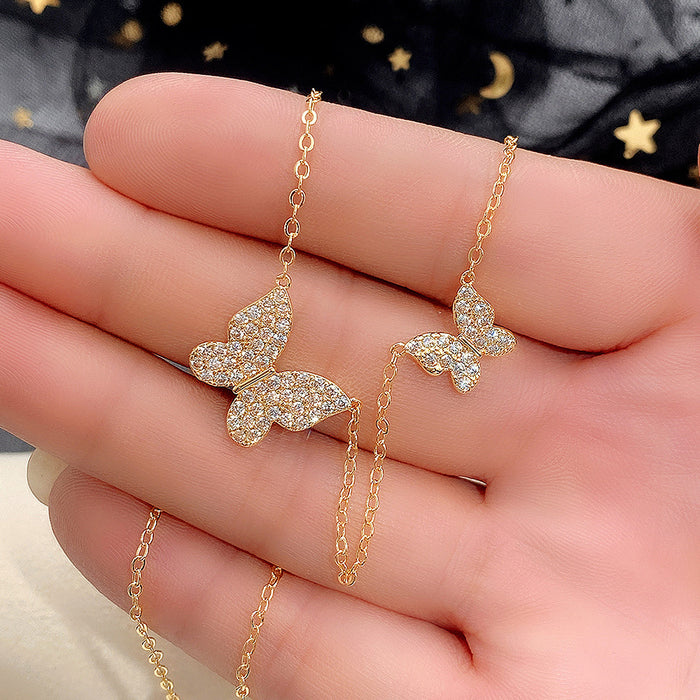 Butterfly Pendant Necklace With Gold Tone Chain With Clear Stone Accents