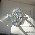 Oversized Oval Clear Solitaire Halo Ring In Silver Tone view 5